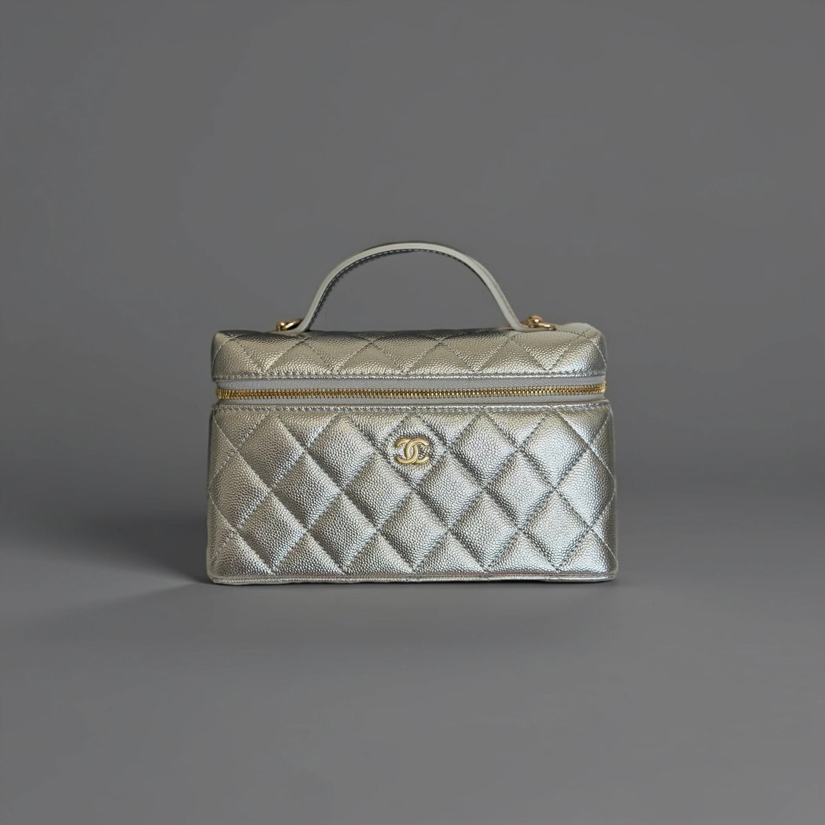 Metallic Caviar Quilted Top Handle Slim Vanity Case With Chain Silver